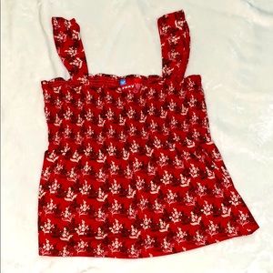 Red floral sleeveless blouse